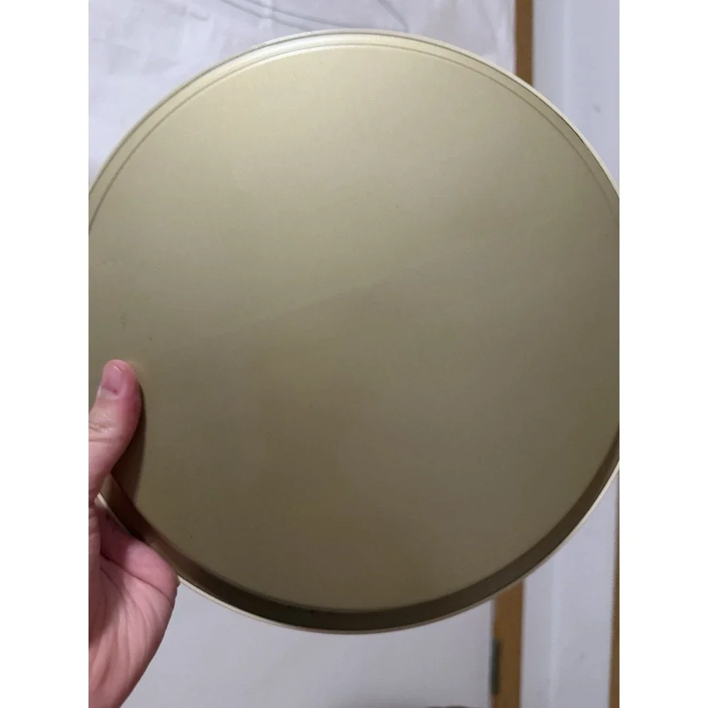 vintage metal Christmas serving tray featuring a wreath design 11in